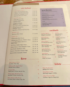 Italian restaurant menu listing pasta and pizza options at Eataly Flatiron
