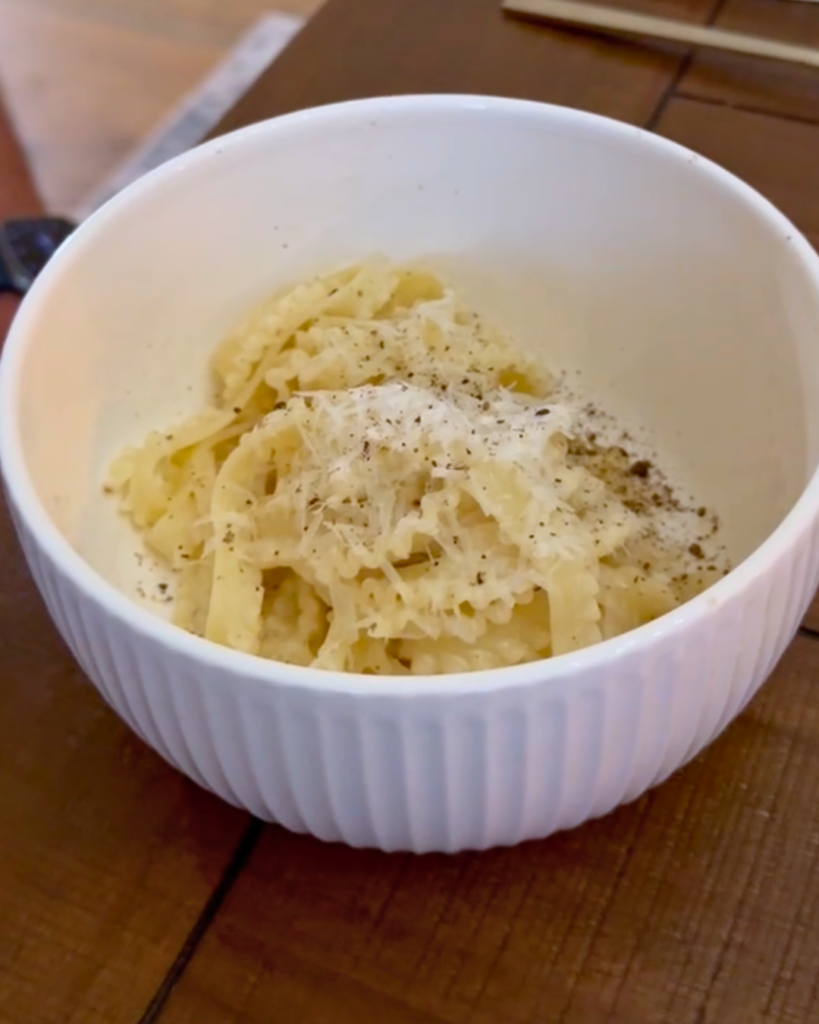 Tripoline cacio e pepe pasta topped with Pecorino Romano and black pepper at Amaro Supper Club in Fairhope.